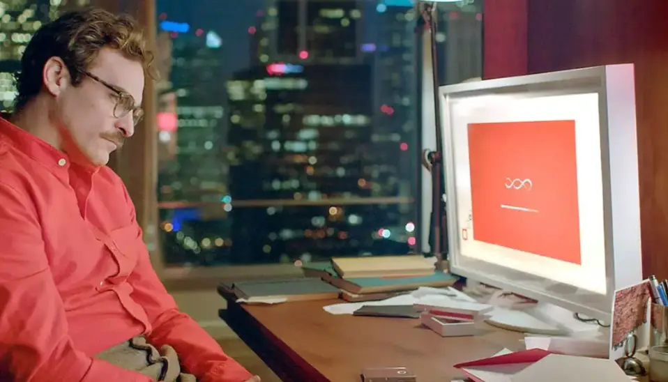 The character falls in love with an AI assistant (Warner Bros. Pictures)