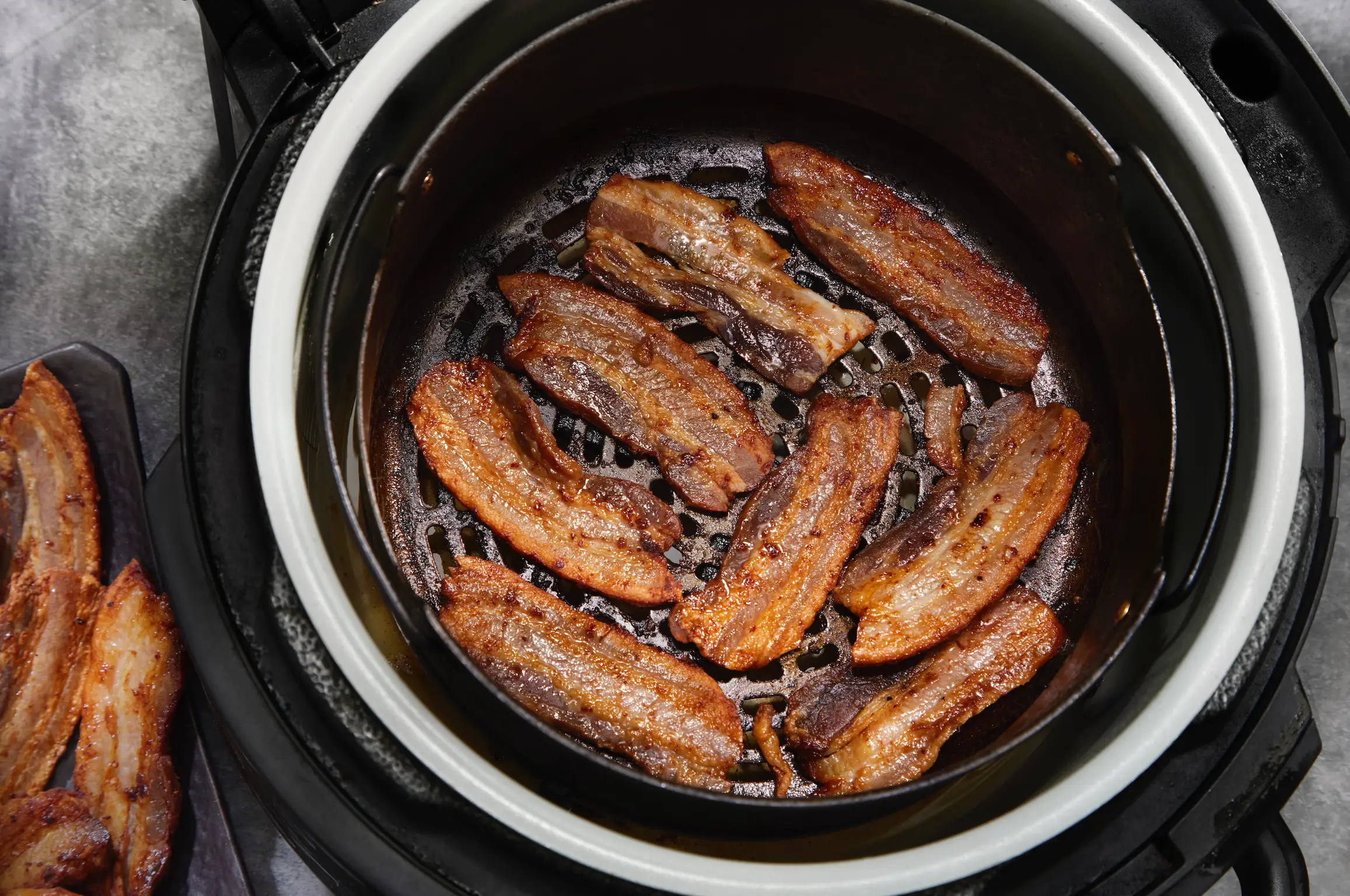 Dietitian Brenda Peralta warns against cooking bacon in an air fryer (Getty Stock Images)