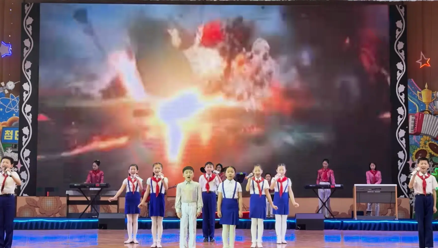 Brits watched as school kids performed for them on a recent trip (YouTube/Mike Okay)