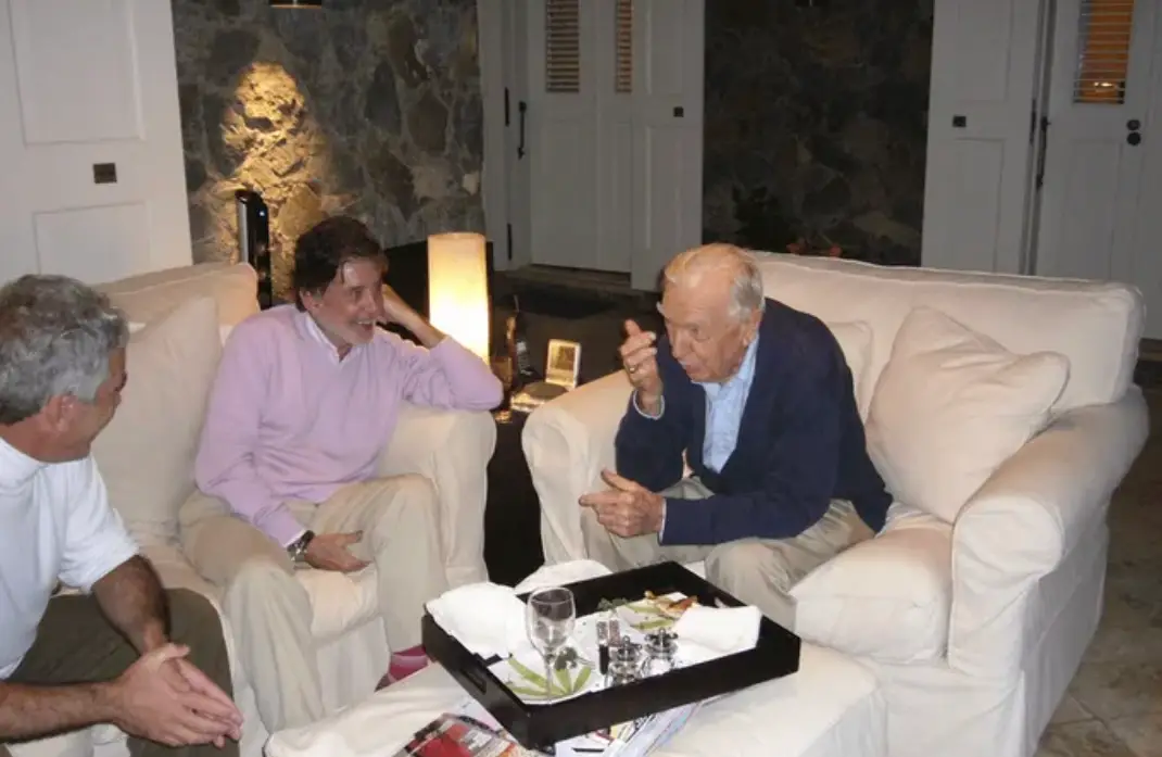 The late broadcaster was pictured alongside Epstein and an unknown man (Department of Justice)