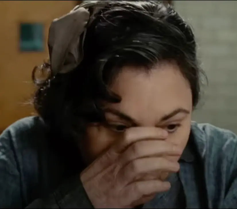 Her glass of water is missing.