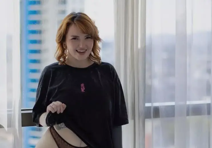 She says modern life is making us lonely and she's happy to fill that void in men's lives (Harper Valentine)