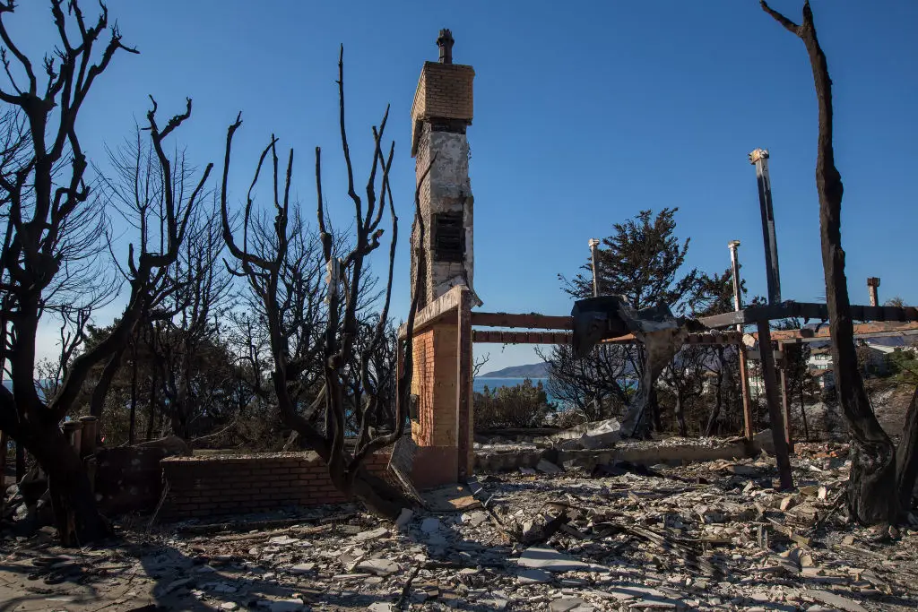 Homes destroyed by the Woolsey Fire in Malibu, California (DAVID MCNEW/AFP via Getty Images)