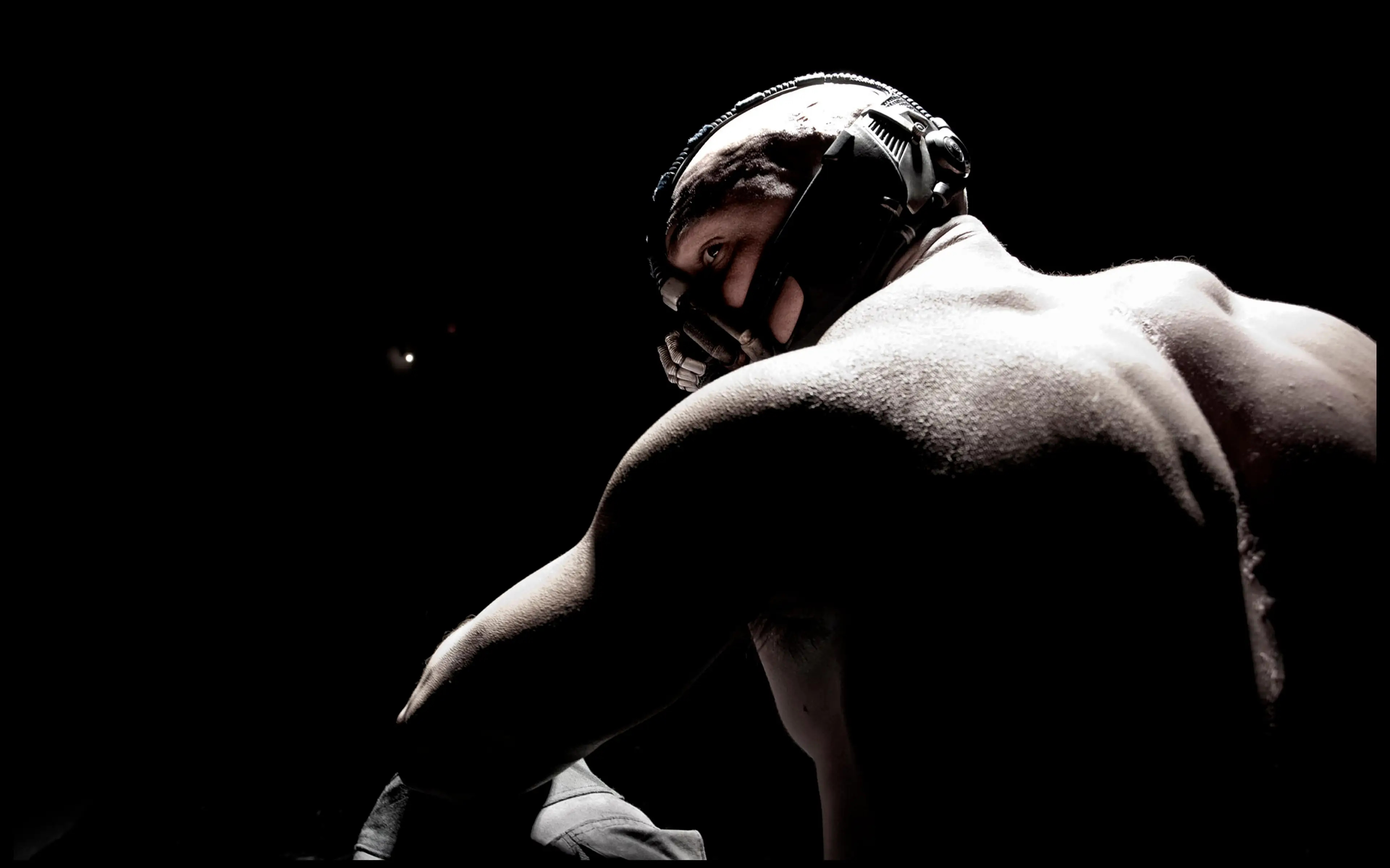 Christopher Nolan chose to cut a scene in The Dark Knight Rises that explained why Bane wore a mask.