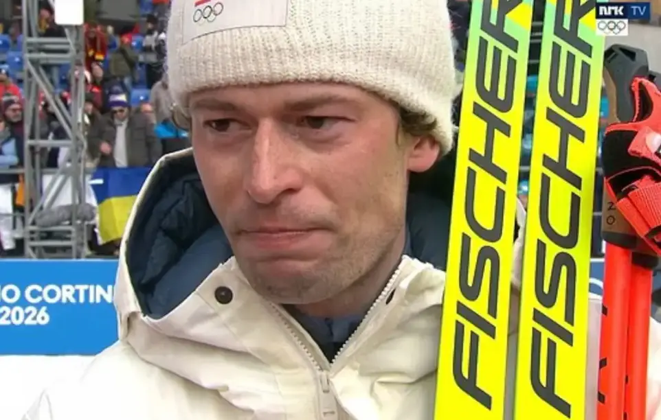 Images of Lægreid holding his skis while tearfully talking to the camera have gone mega viral (NRK TV)