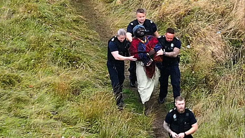 African 'tribe' living in Scottish forest arrested in shocking footage on livestream