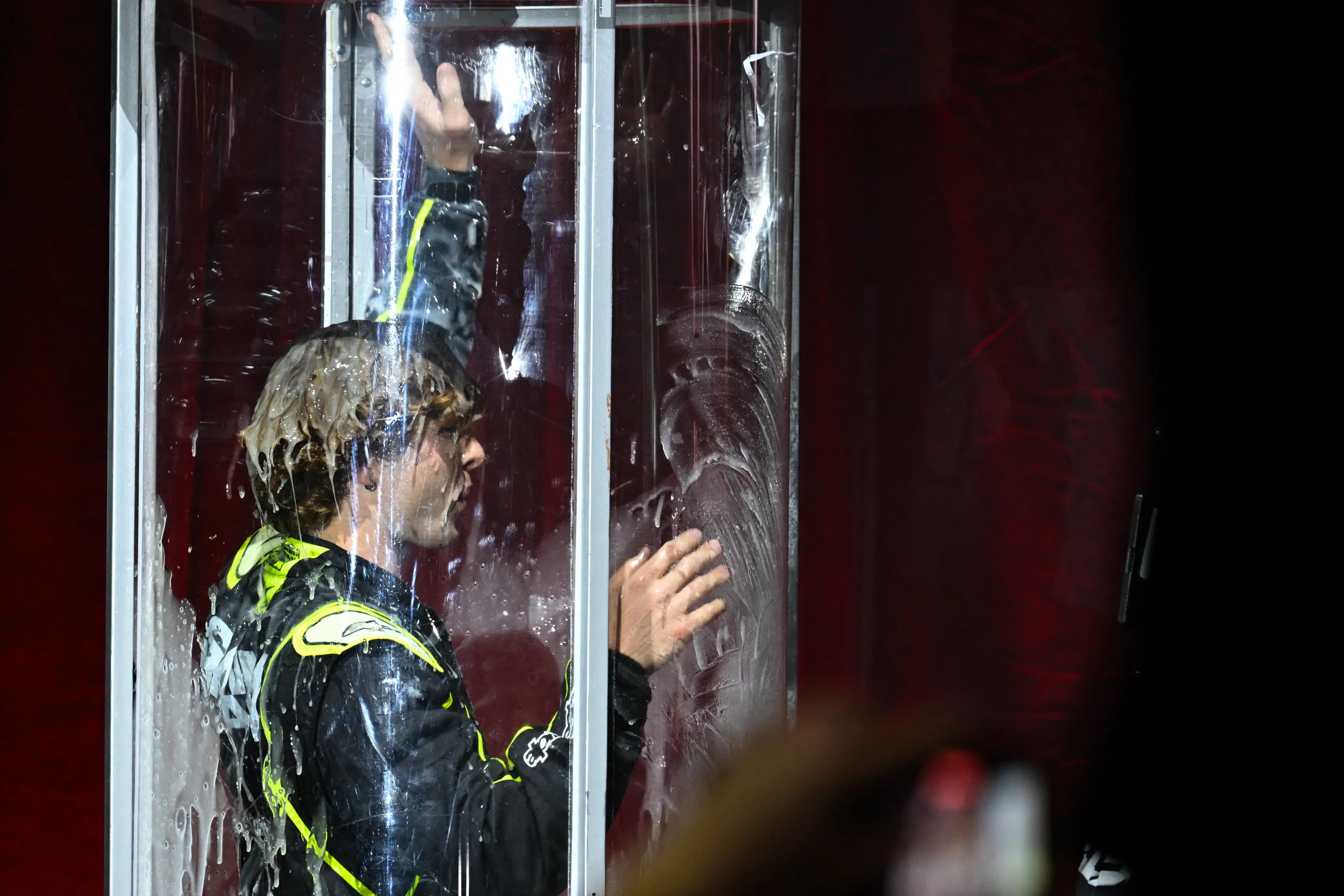 Asher Proeger came second and was covered in slime (not that kind) for his forfeit (PATRICK T. FALLON/AFP via Getty Images)
