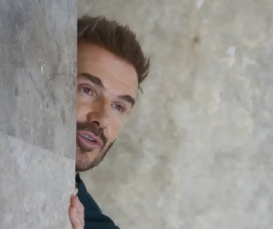David Beckham recreated the documentary scene with the same shot of him peaking around the corner.
