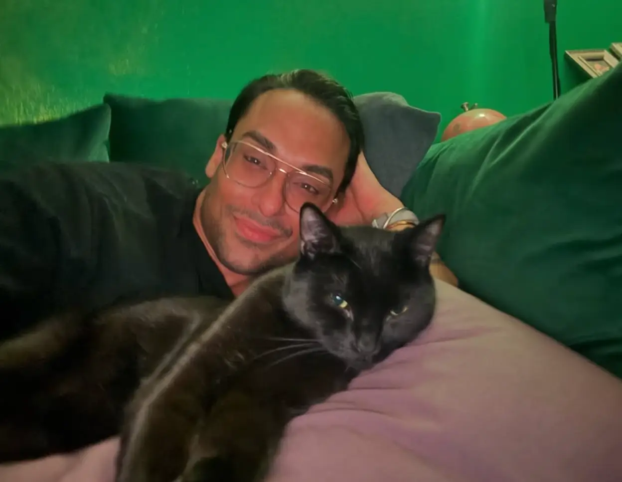 His cat provides vital companionship. (Patrick Kitana Ettenes)