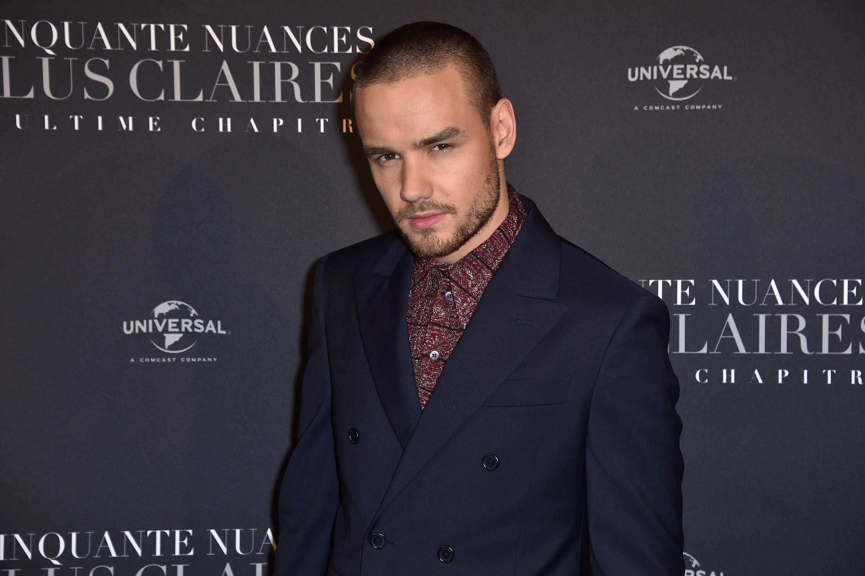 Police are questioning five people in connection with One Direction singer Liam Payne's tragic death in an Argentinian hotel (Stephane Cardinale - Corbis/Corbis via Getty Images)
