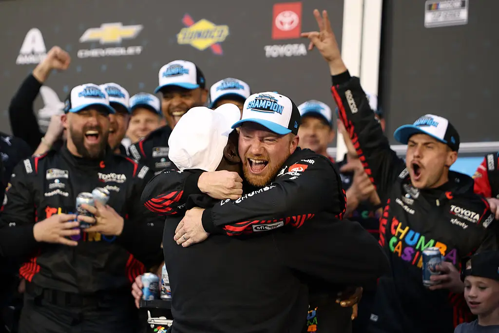 Reddick hugged Jordan after his Daytona 500 victory (James Gilbert/Getty Images)