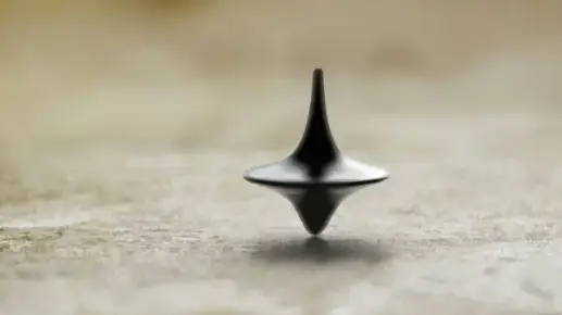 Is it a dream or is it reality? According to Nolan, the answer's been there all along (Warner Bros. Pictures)