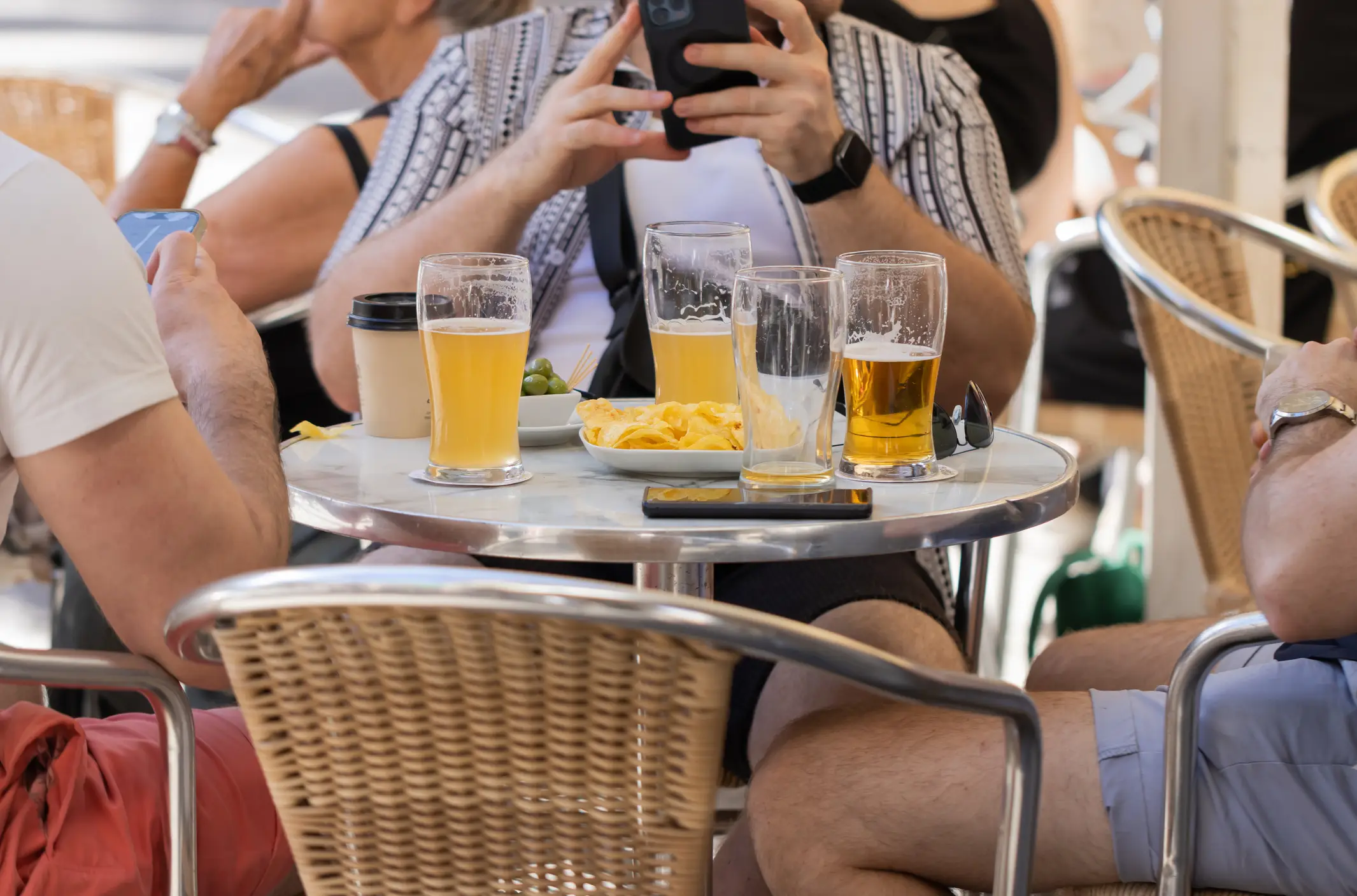 Not much beats lounging around with your mates on holiday, with a cold drink in hand (Getty Stock Image)