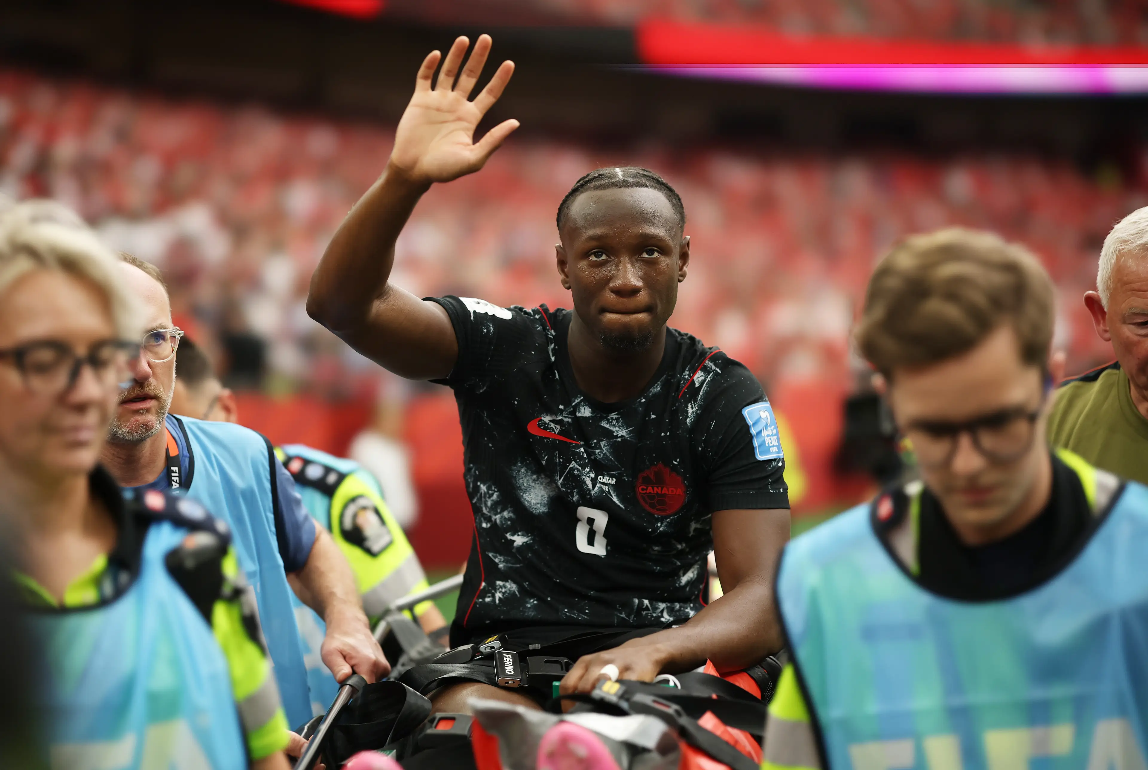 Ismael Kone waves to fans as he leaves the pitch. (Jared C. Tilton - FIFA/FIFA via Getty Images))