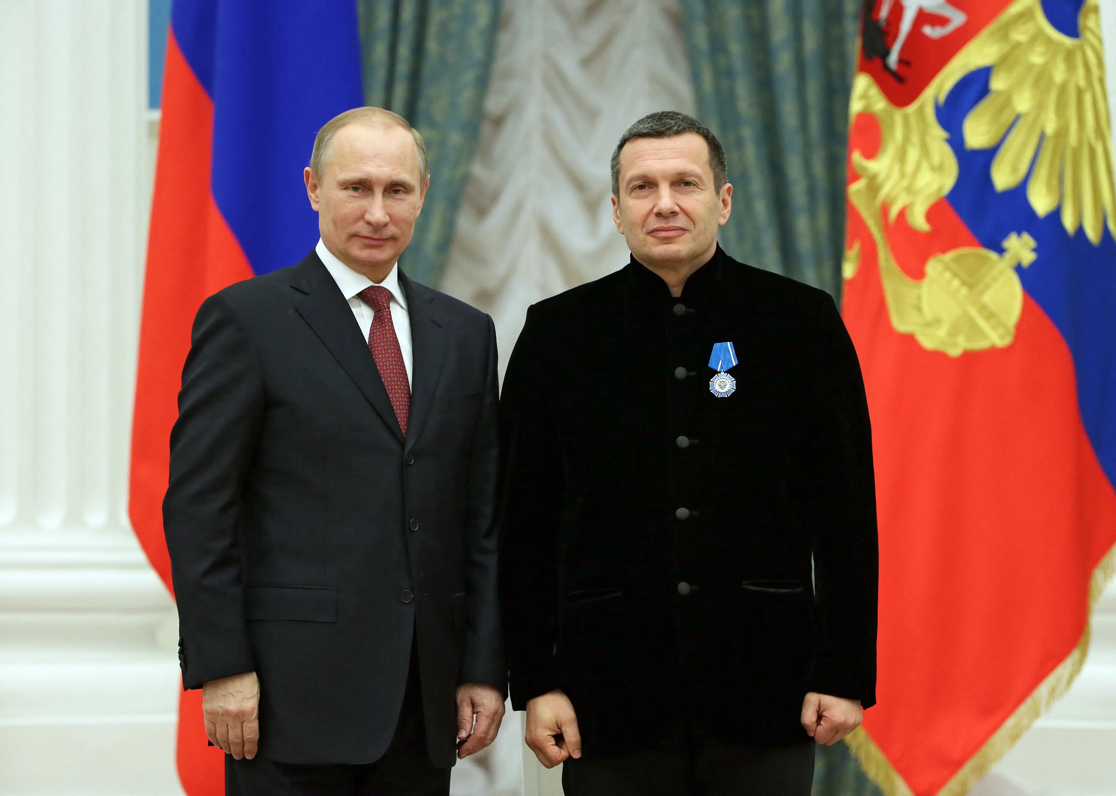 Vladimir Putin and Vladimir Solovyov (MIKHAIL METZEL/SPUTNIK/AFP via Getty Images)