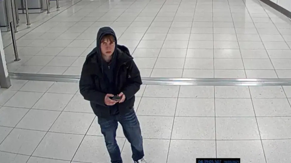 Natland at the airport before entering the UK (Counter Terrorism Policing)