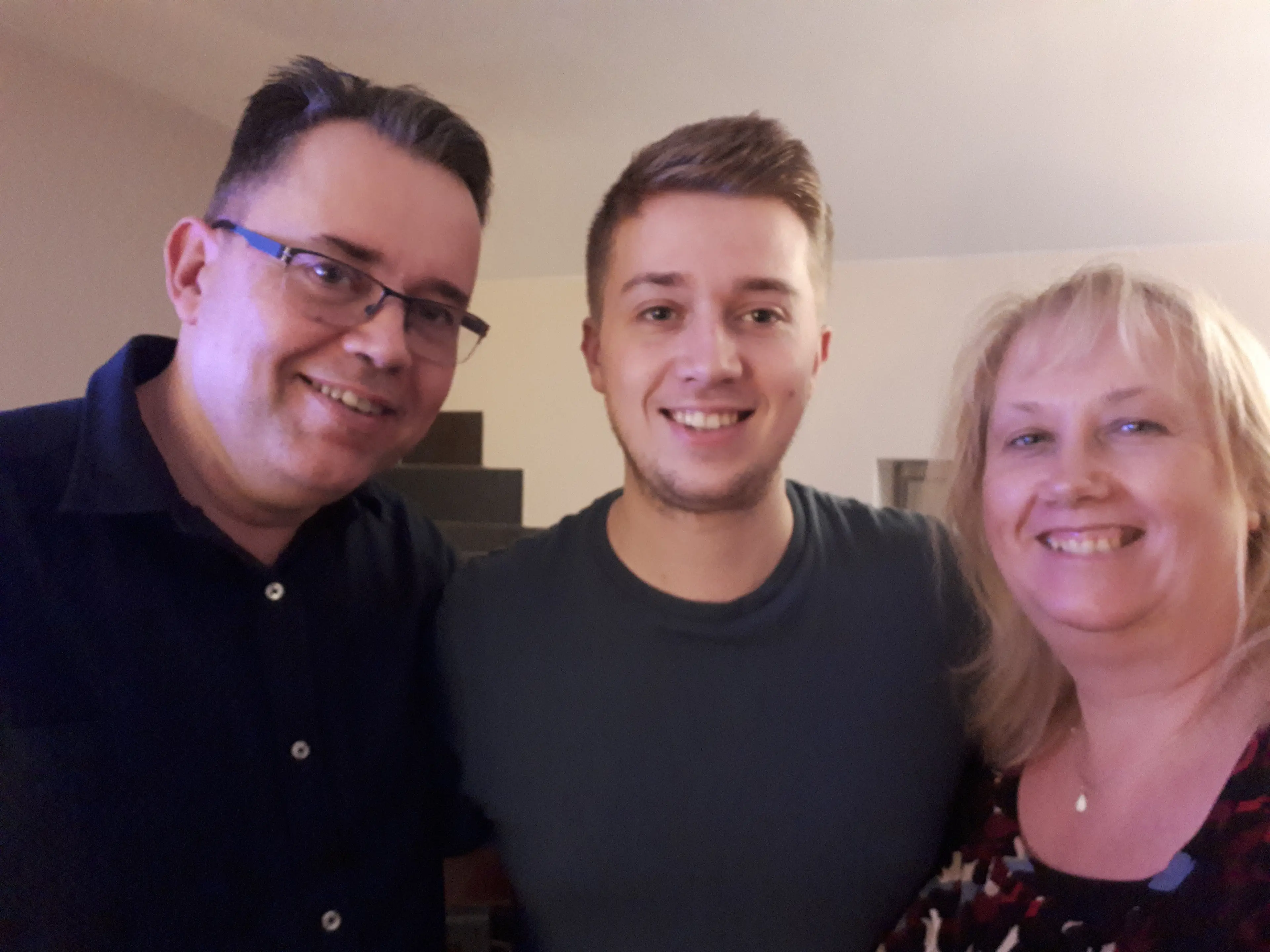 Sam along with his dad Mark and mother Debbie (Supplied)