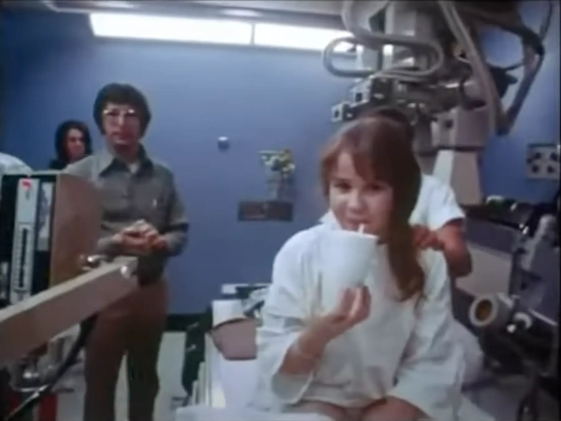 Bateson rested his hand on Blair's shoulder.