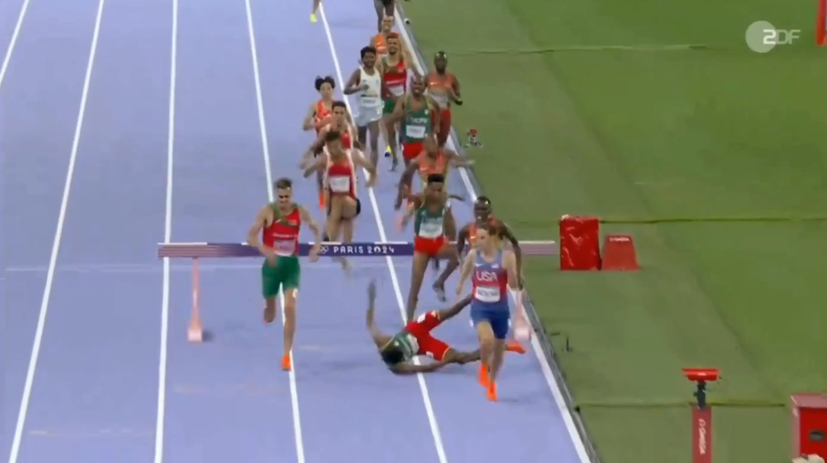 The sporting world held their breath when Lamecha Girma fell to the ground. (Peacock)