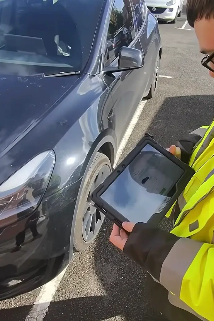 Harley Perkins was left stunned by how much value his Tesla Model Y had lost in just one year (YouTube/@harleygperkins)