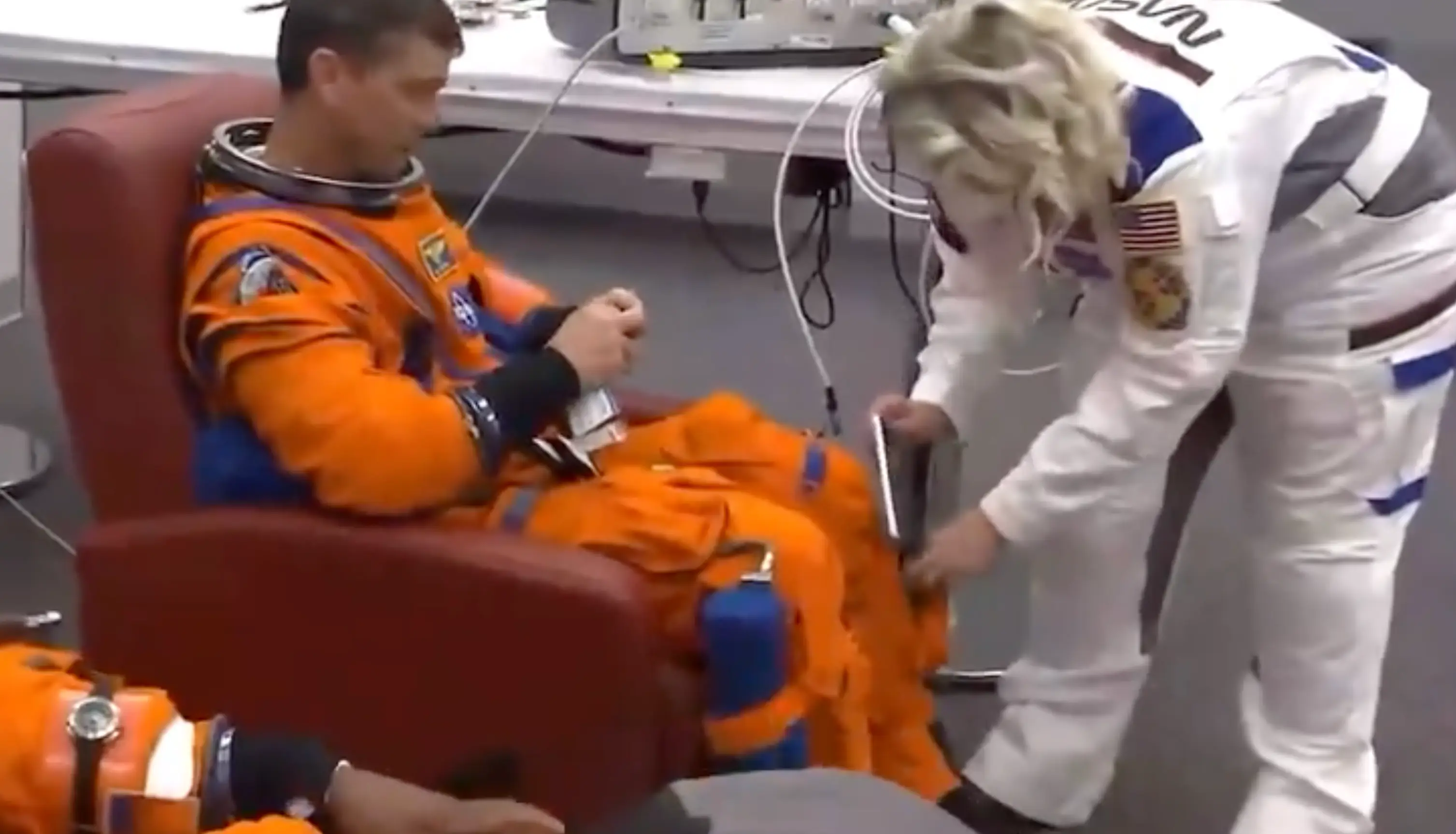 Astronauts could be seen with iPhones being placed into pockets on their spacesuit (NASA)