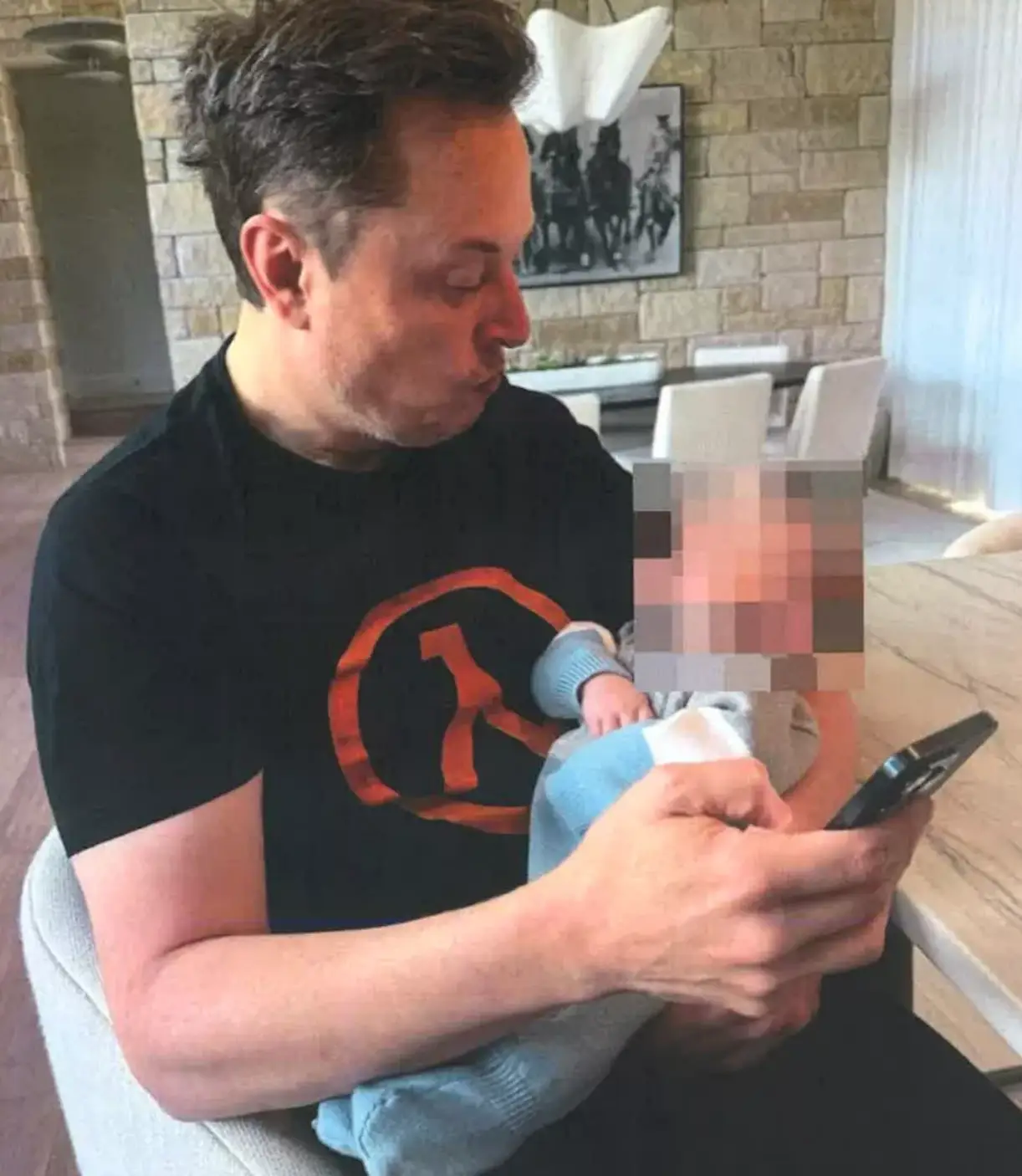 An image submitted in the petition which St Clair claims is Musk holding their son (Supreme court of the state of New York, county of New York)