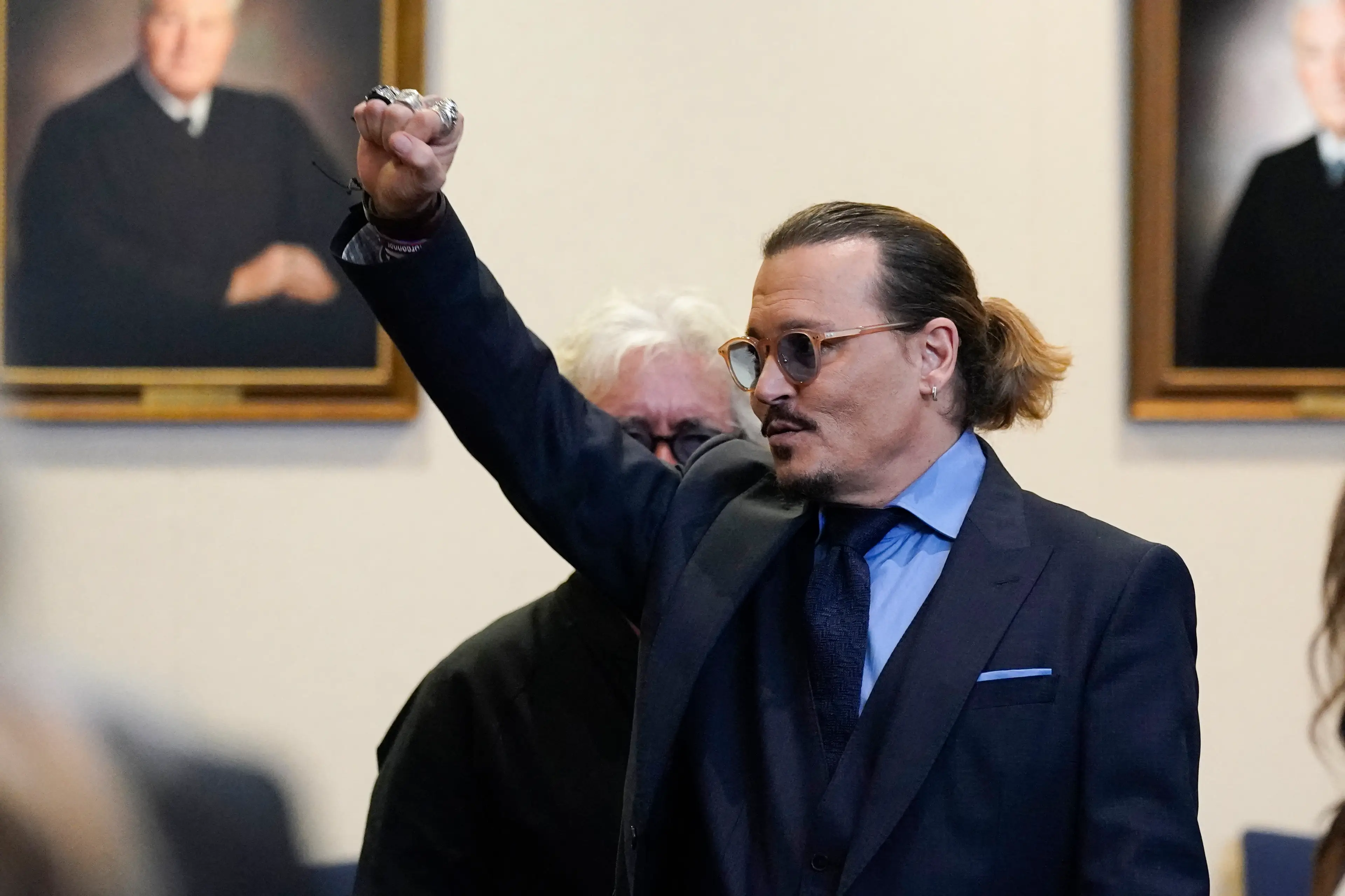 Depp won his case in the US but did lose here in the UK. (STEVE HELBER/POOL/AFP via Getty Images)