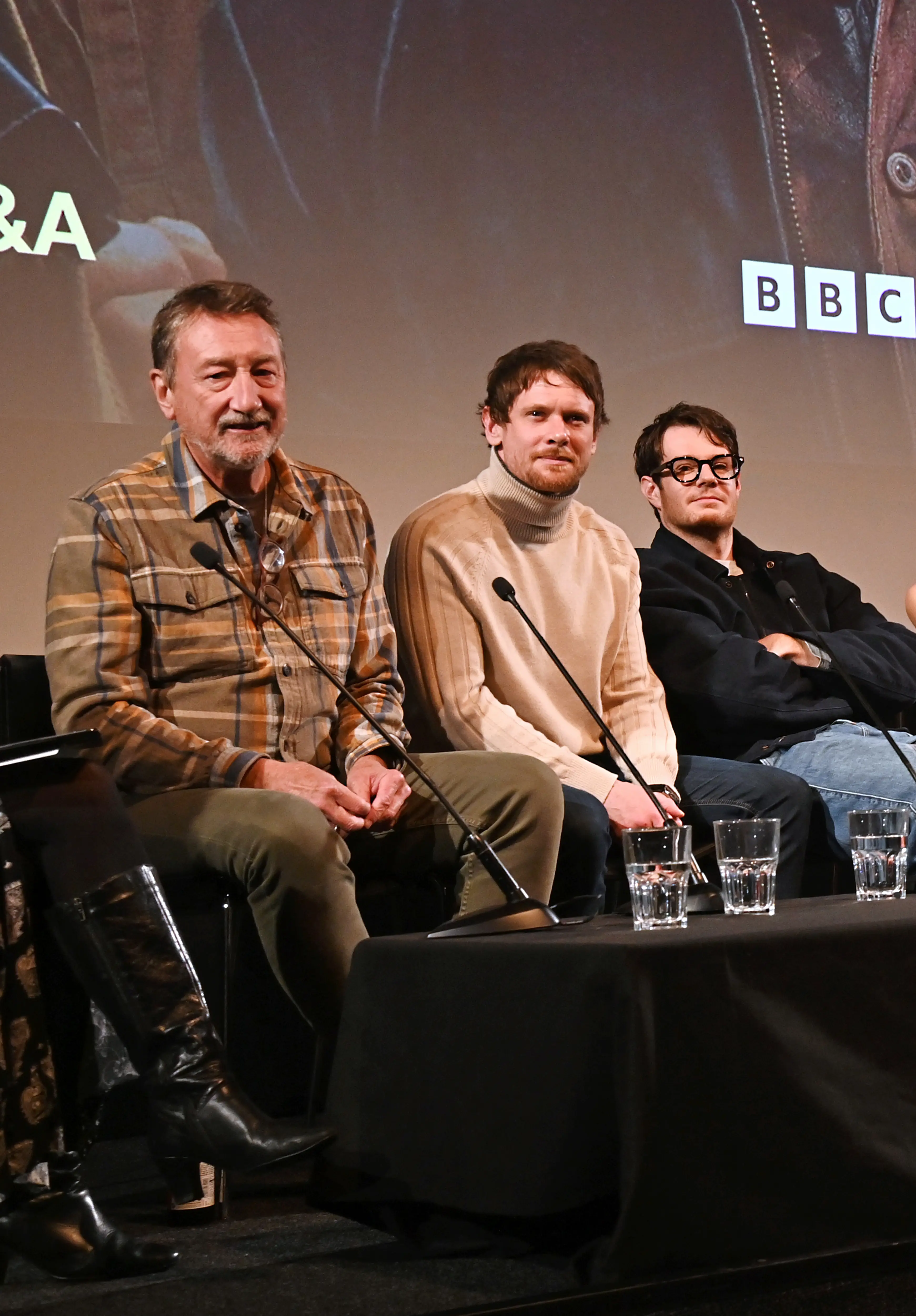 Steven Knight alongside the show's co-stars Jack O'Connell and Connor Swindells (Dave Bennet via Getty Images)
