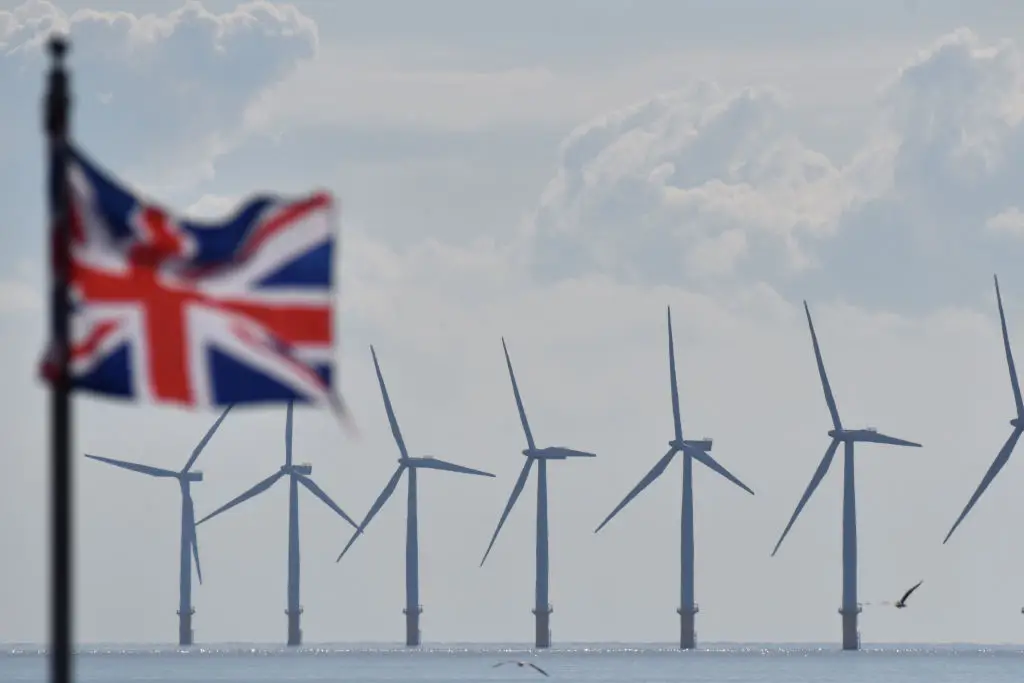 More wind farms and solar panels are needed to generate extra electricity without having to use fossil fuels to fill the gap  (Photo by John Keeble/Getty Images)
