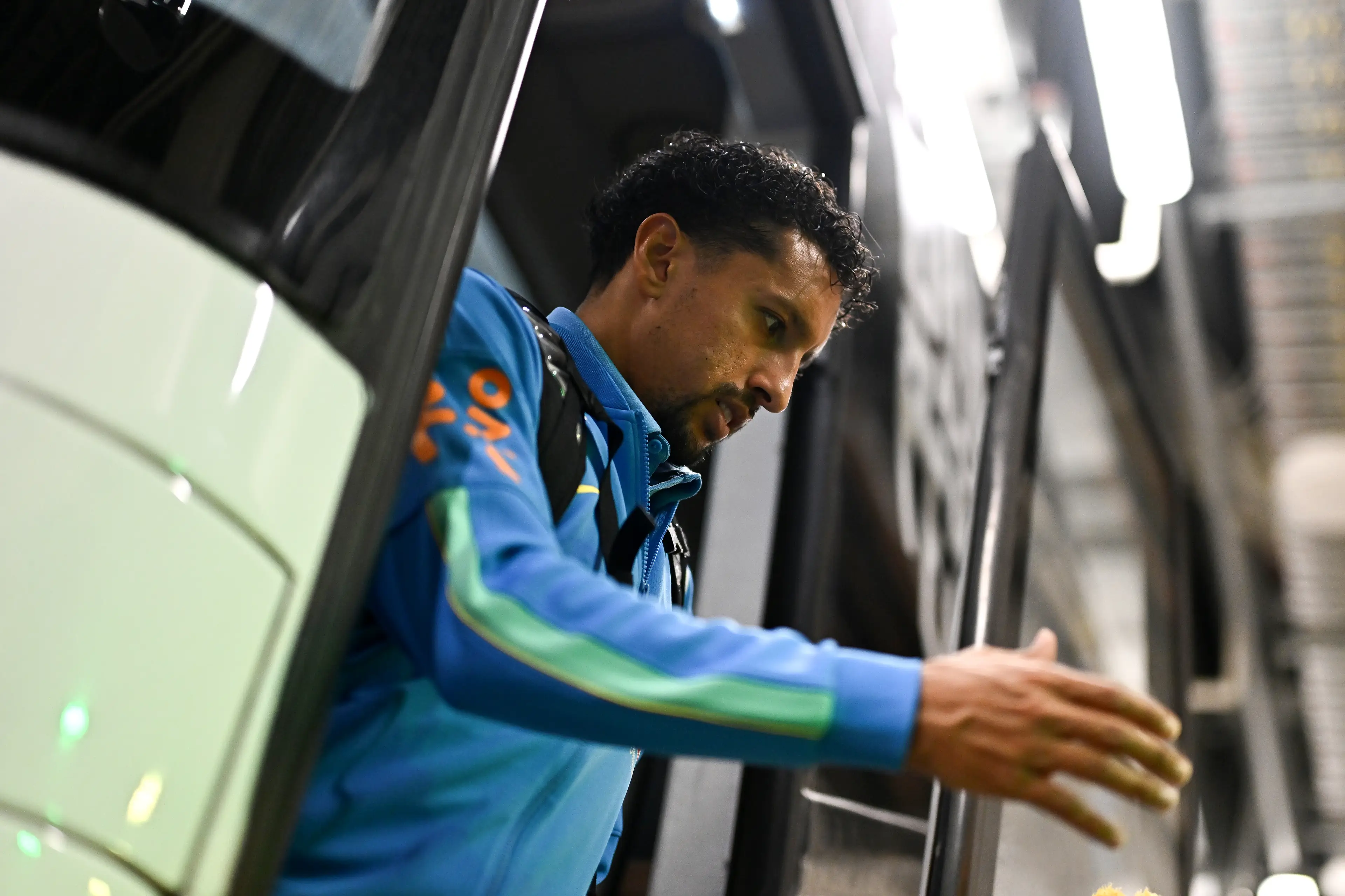 Brazilian defender Marquinhos exits the team coach outside Queensland Country Bank Stadium (Albert Perez/Getty Images)