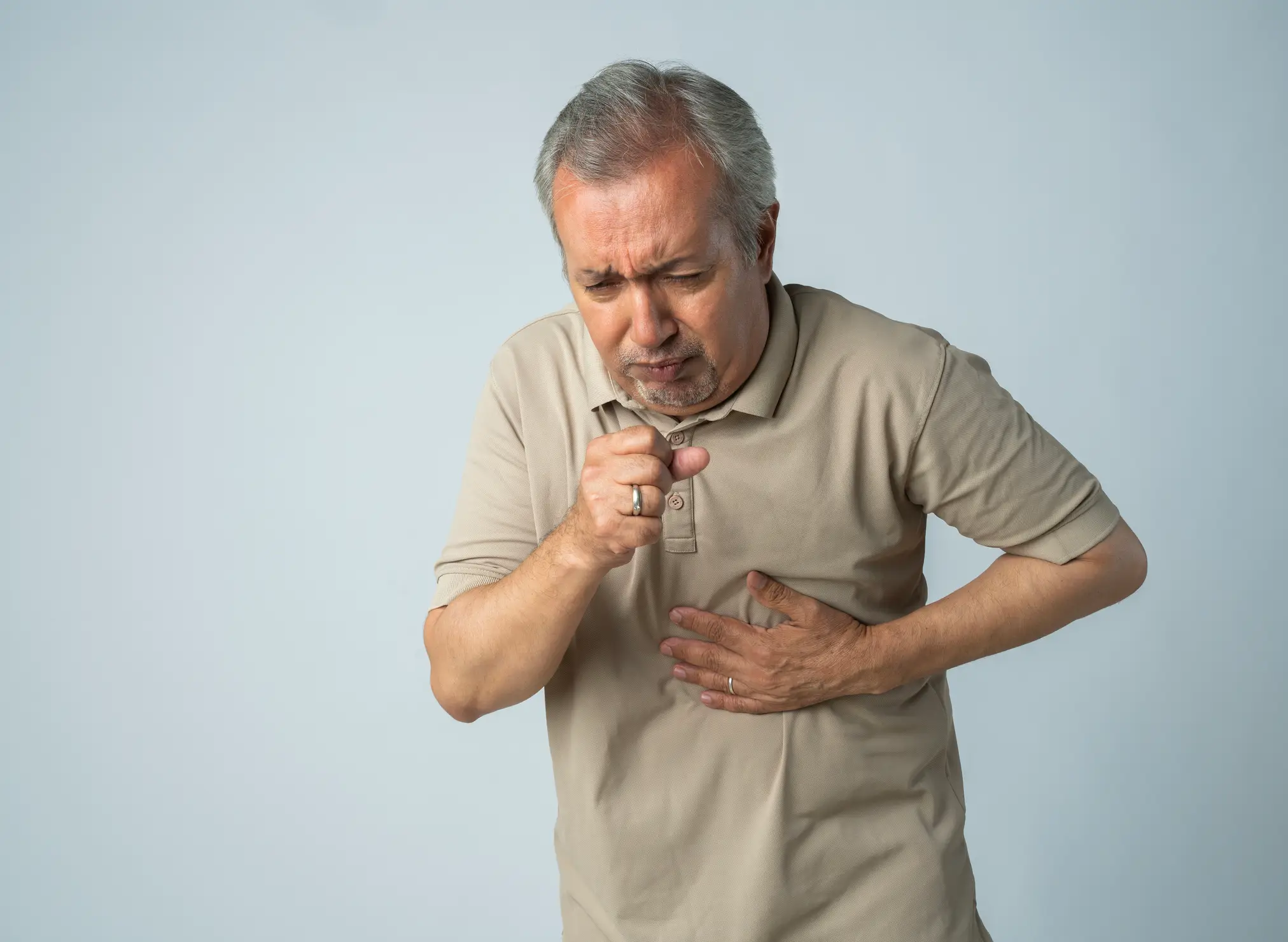 It's more than just a cough that you'll need to look out for (Getty Stock)