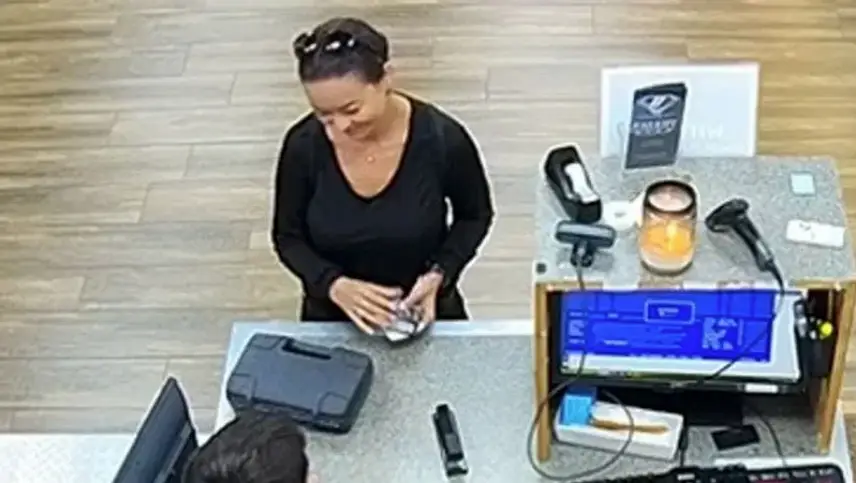 Mica seen at the checkout at Dick’s Pawn Shop (Robeson County Sheriff's Office)