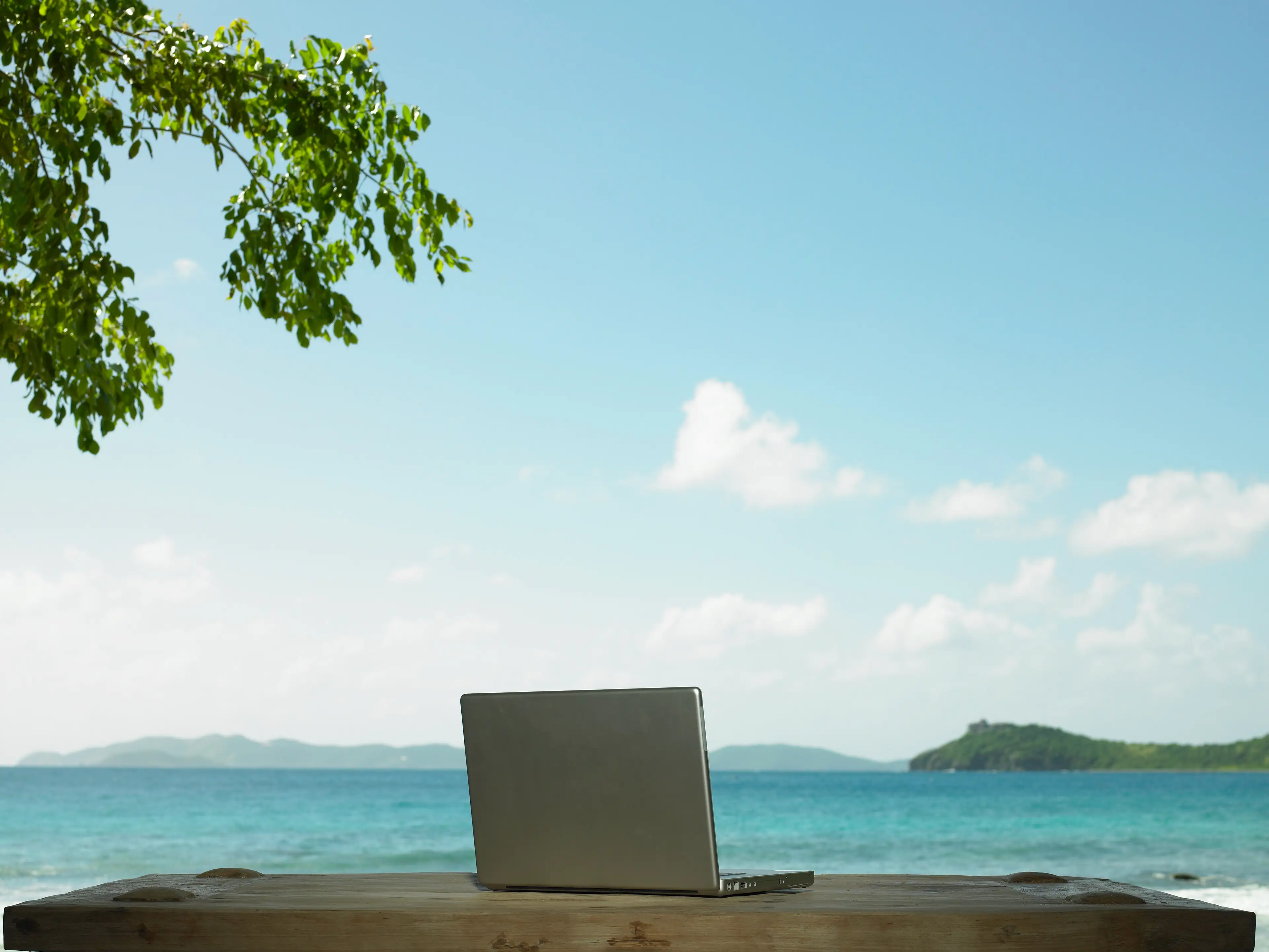 "No boss, I've not gone on holiday without telling you. This is just my Zoom background." (Getty Stock Photo)
