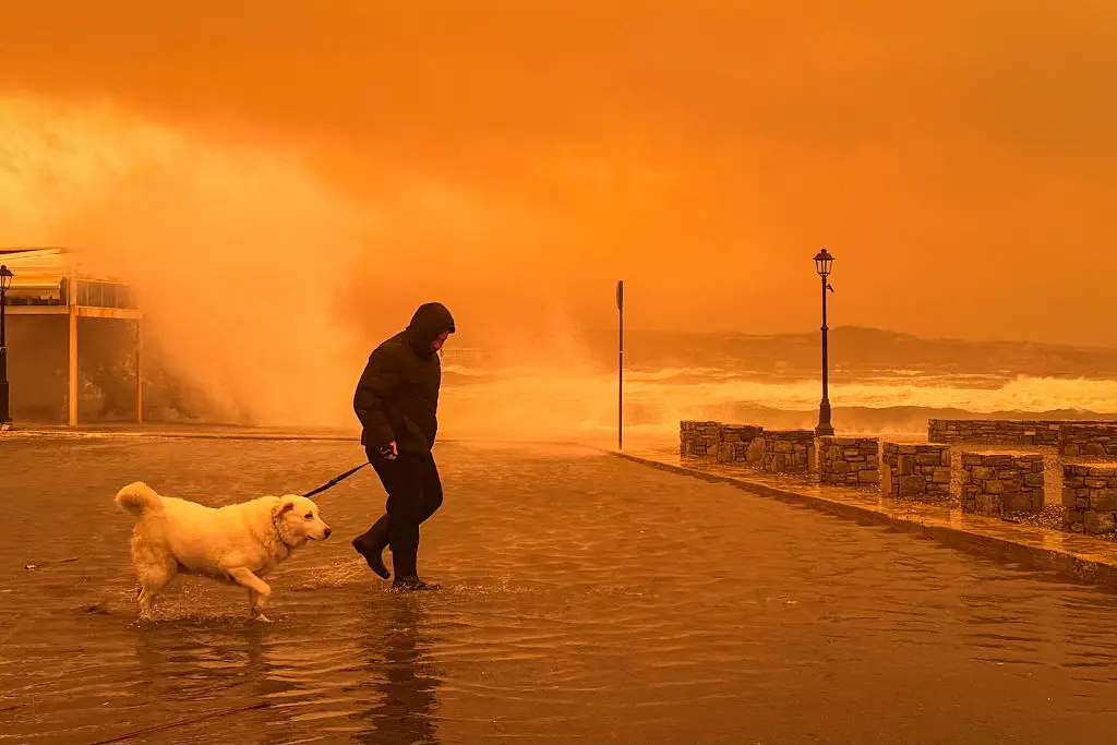 Holidaymakers stranded in Crete have been hit by a red weather warning after a Saharan dust storm paints the region orange (Eleftherios Elis / AFP via Getty Images)