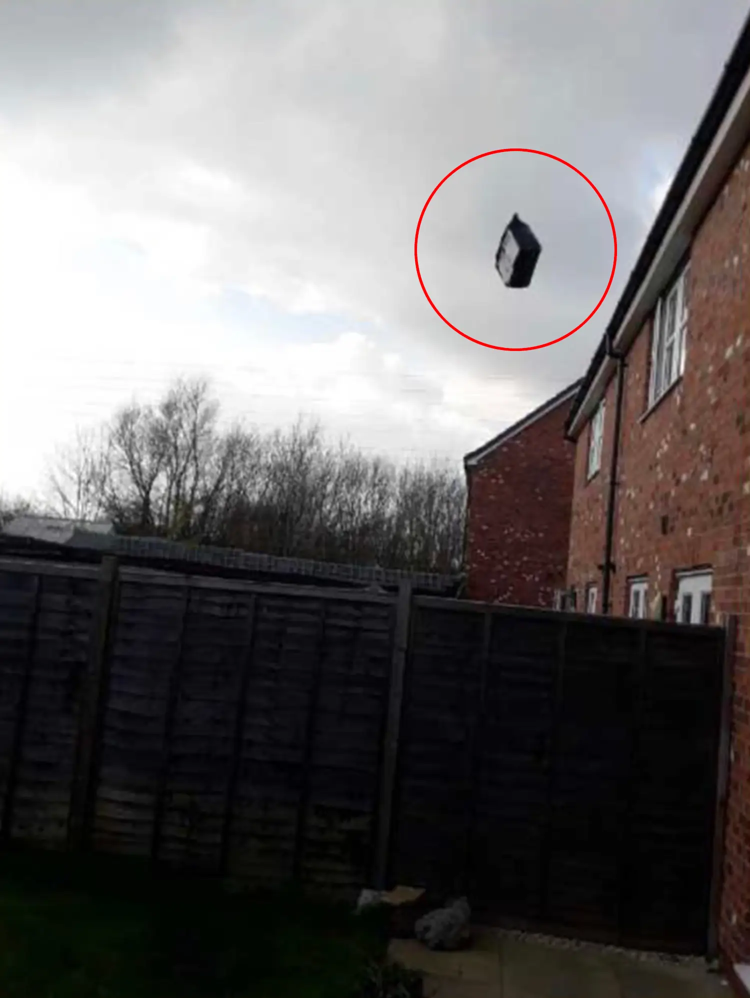 A delivery driver chucked a customer’s parcel over two garden fences instead of taking it to their front door.