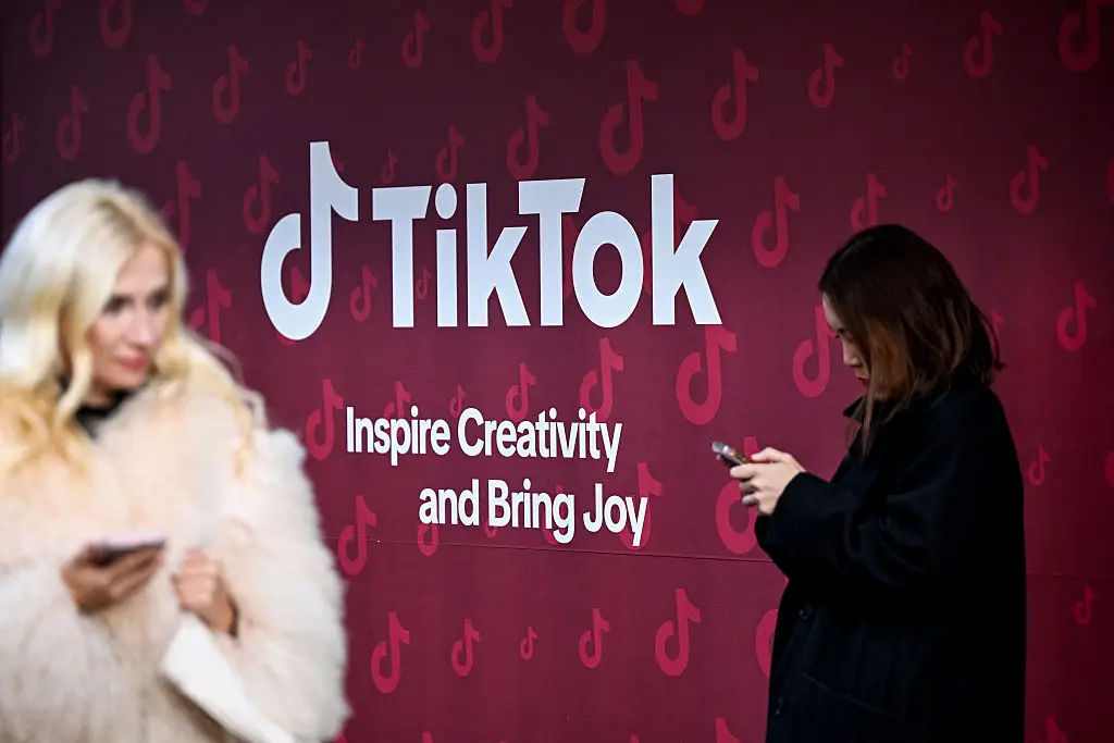 Users will have to pay to stop receiving personalised TikTok ads. (INA FASSBENDER / AFP via Getty Images)