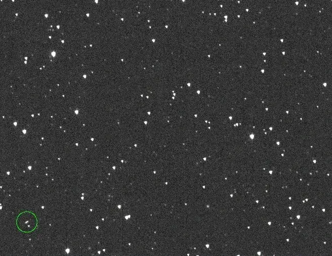 The 2024 YR4 asteroid circled in green, bottom left (ATLAS)