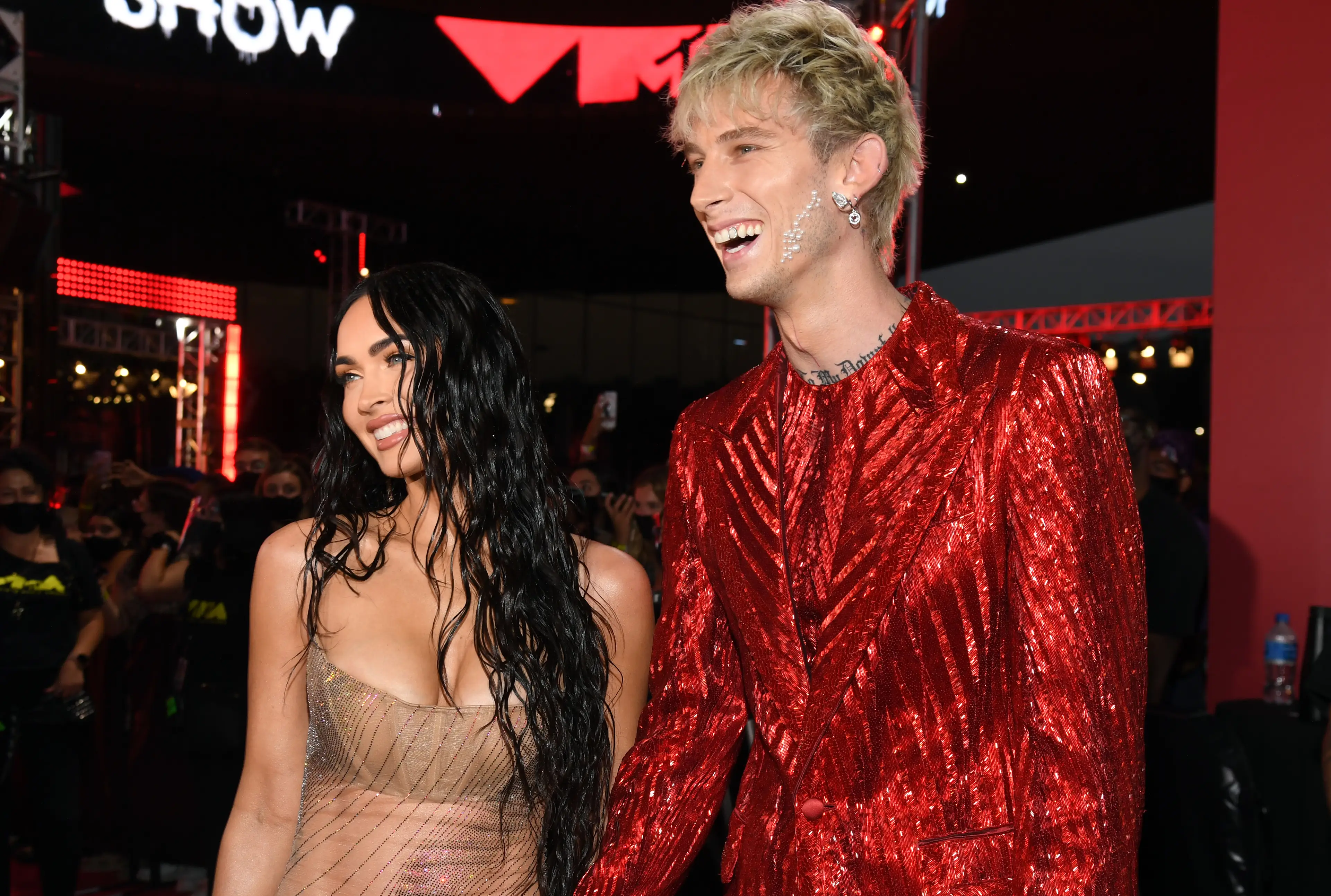 MGK has seemingly hit back claims that he isn't in contact with the mum-to-be (Kevin Mazur/MTV VMAs 2021/Getty Images for MTV/ ViacomCBS)