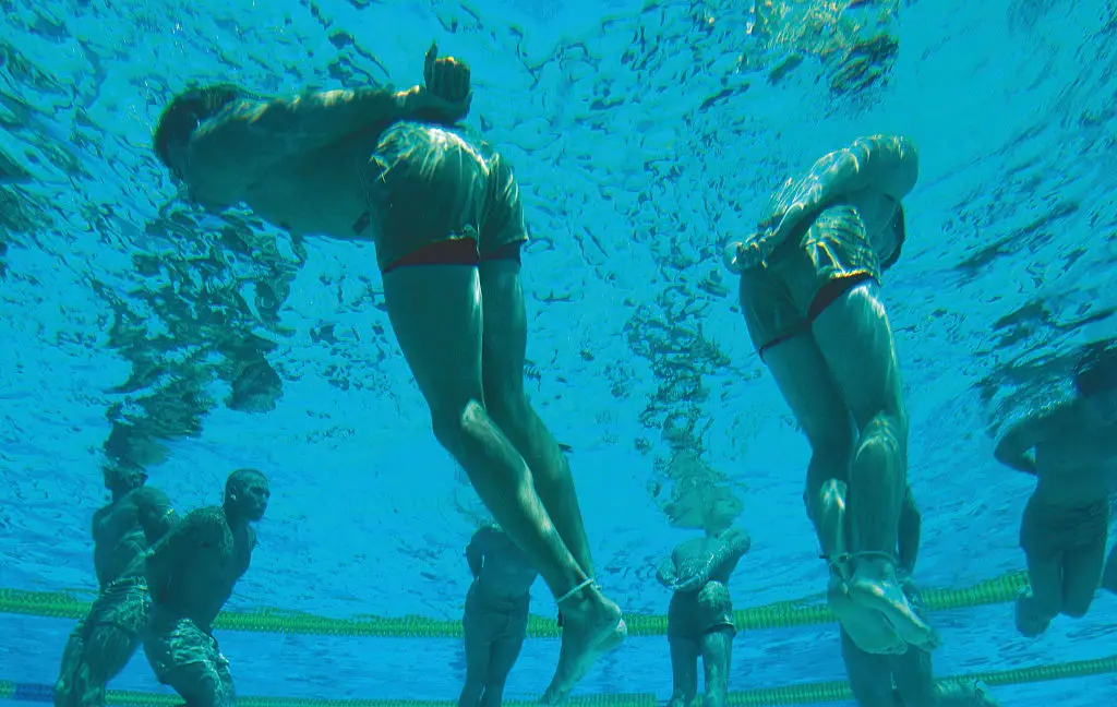 The drownproof training involves various stages, including tying candidates hands and feet together. (Richard Schoenberg/Corbis via Getty Images)