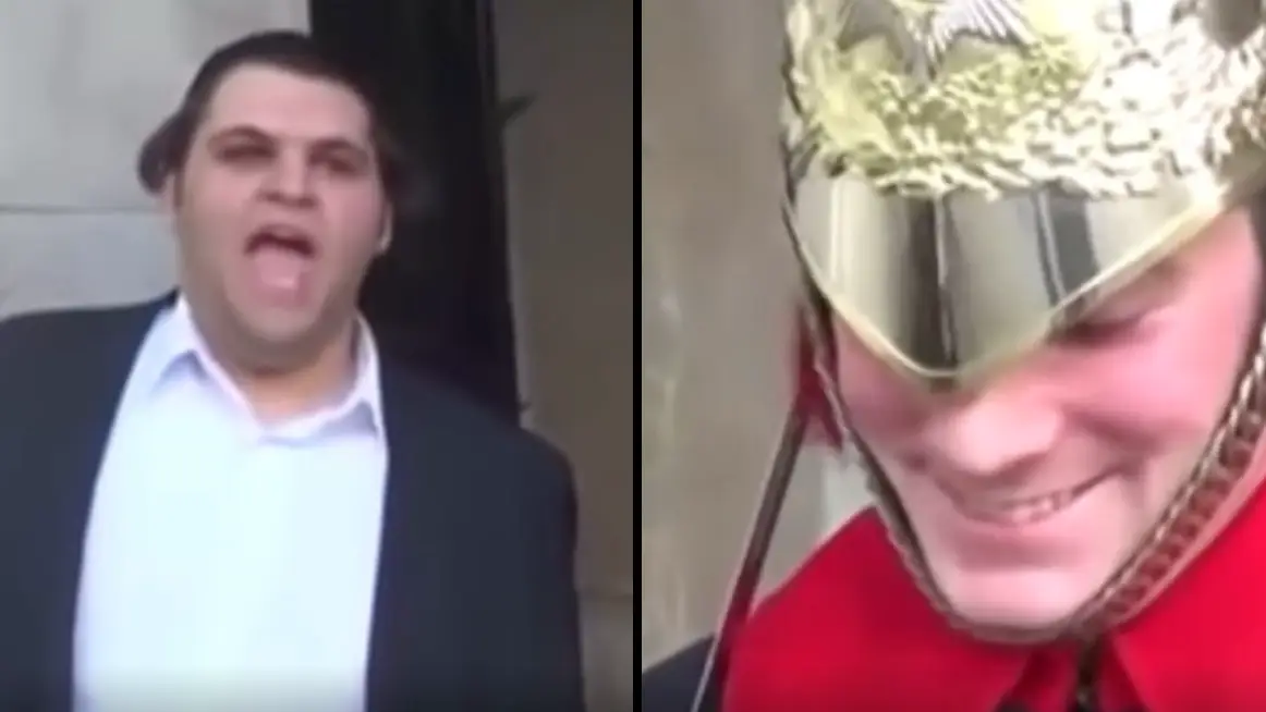 Man succeeds in making Royal Guard crack a smile and people fear he may lose his job