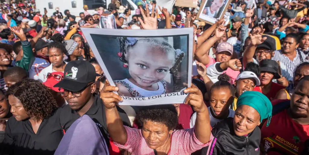 Protests were held outside the court following the initial arrest last year (Brenton Geach/Gallo Images via Getty Images)