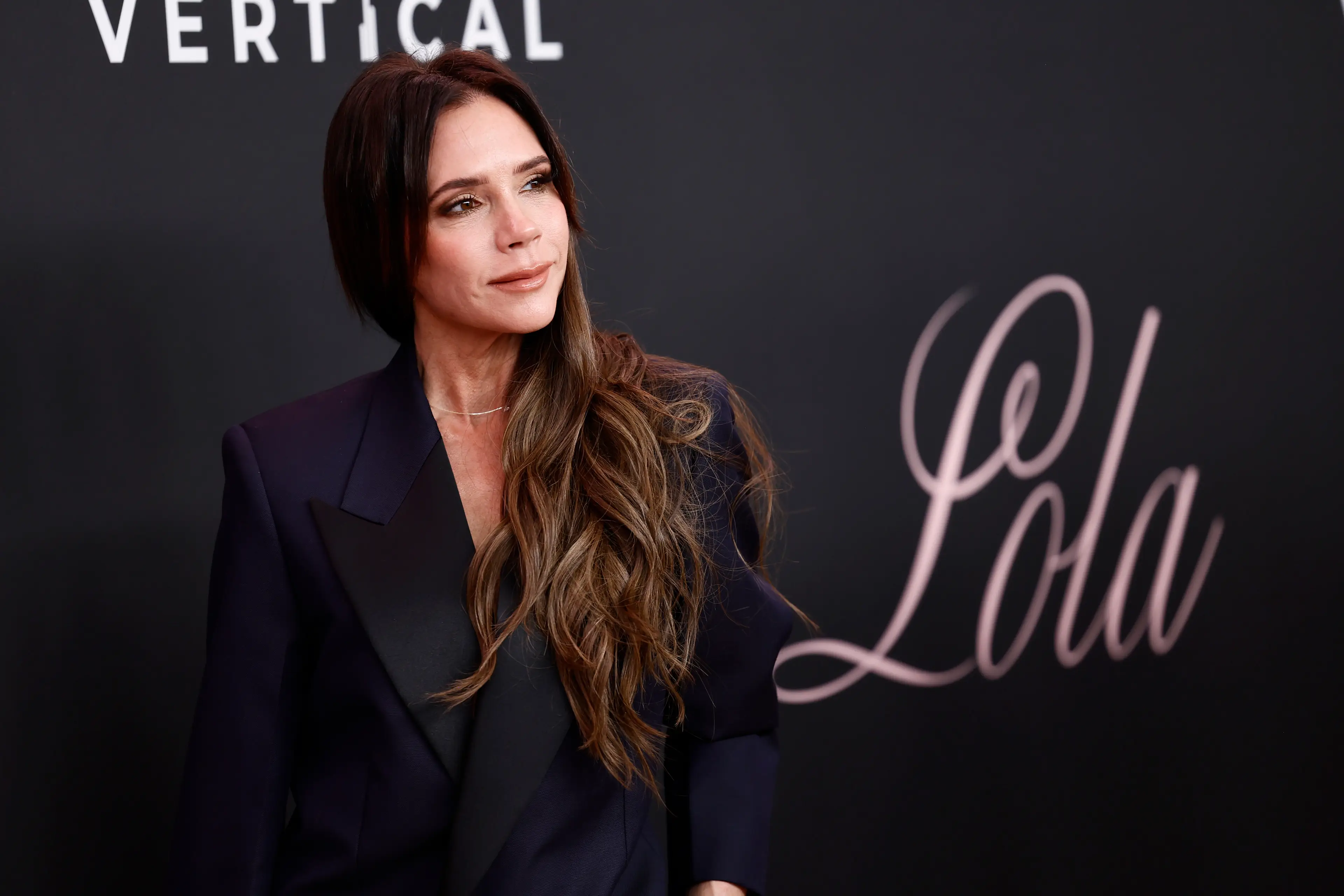 Victoria Beckham has a reason why she doesn't tend to smile in pictures. (Frazer Harrison/Getty Images)