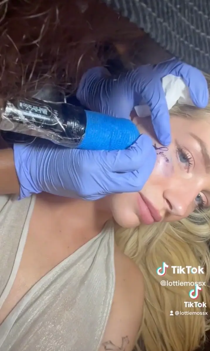 Lottie Moss has got a tattoo on her face now.