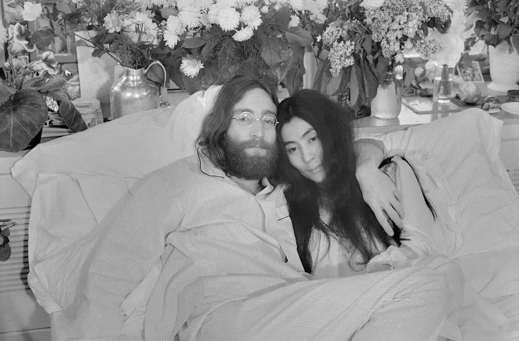 Lennon and his wife Yoko Ono spread messages of peace prior to his death (Getty/Bettmann)