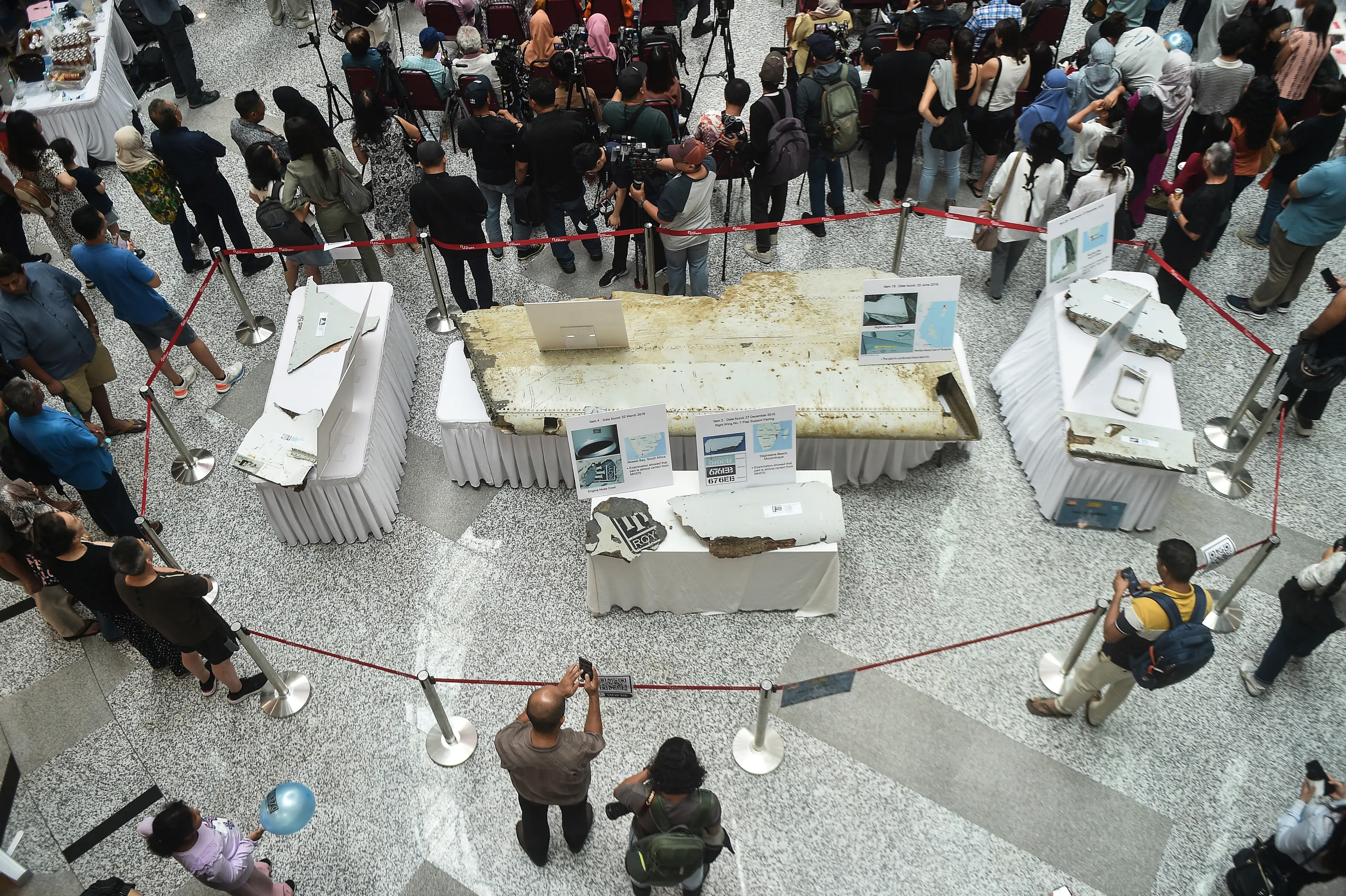 Parts of the plane washed up, and was put on display to mark the tenth anniversary (Photo by Arif Kartono / AFP) (Photo by ARIF KARTONO/AFP via Getty Images)