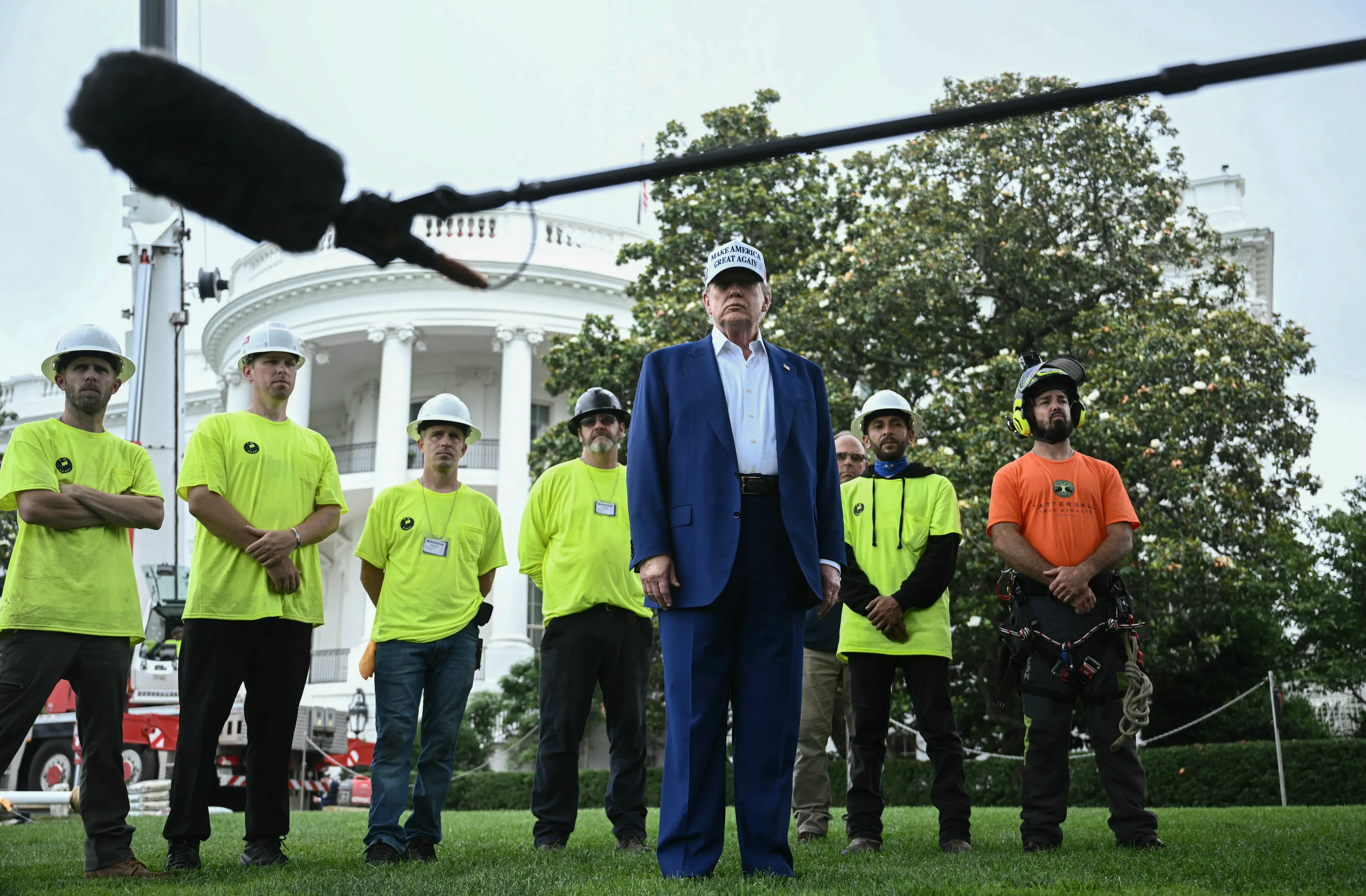 Donald Trump was celebrating the installation of two 'magnificent' flag poles at the White House yesterday (BRENDAN SMIALOWSKI/AFP via Getty Images)