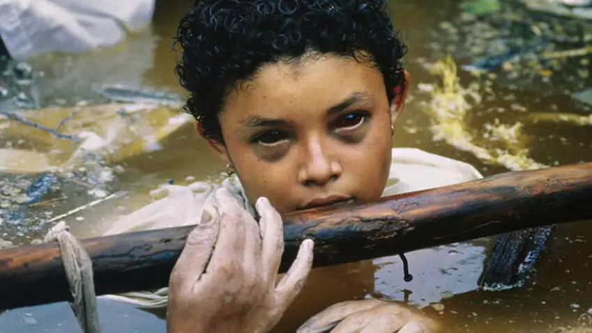 Why photographer who took haunting shot of trapped girl with black eyes didn't try and save her