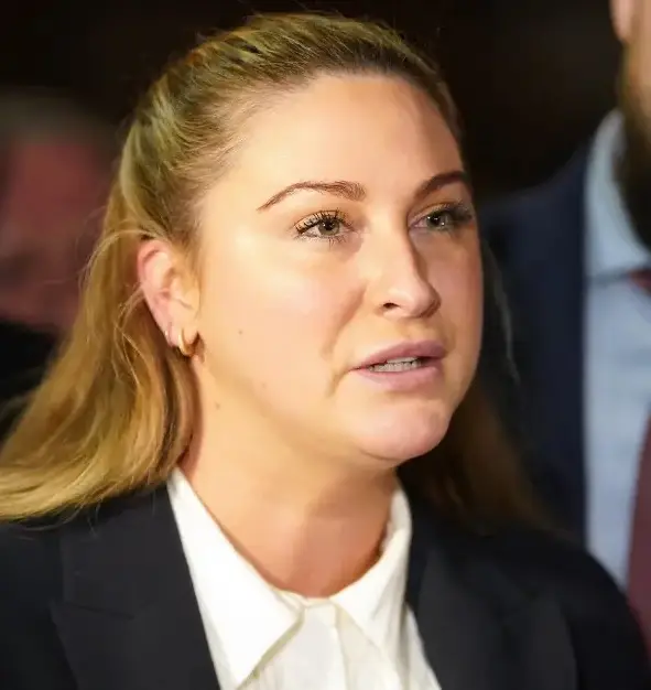 Nikita Hand claimed that a group of masked men burst into her house and attacked her partner (