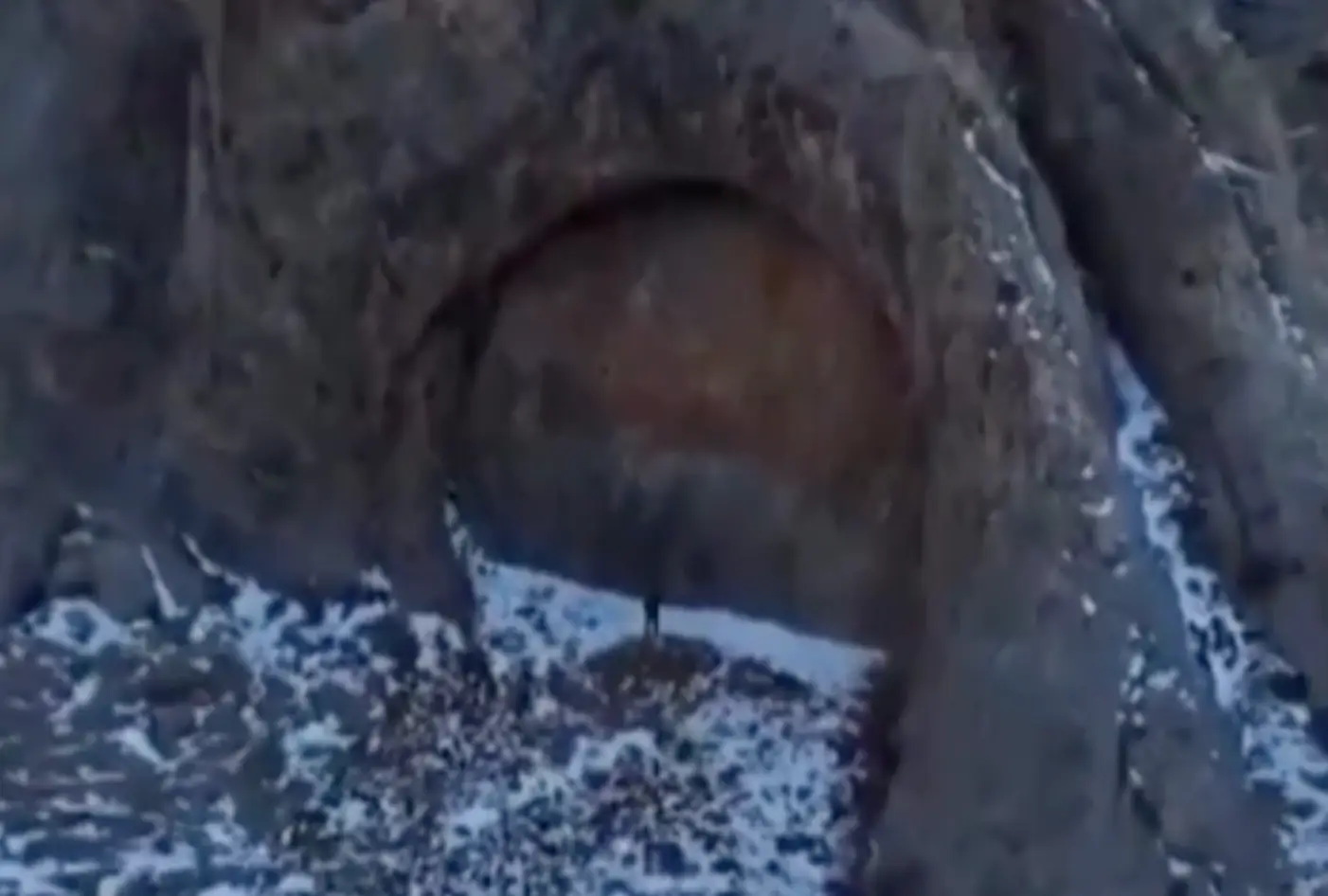 People online were left perplexed by the 'door' shape in the Dzungarian Alatau mountain range (Reddit)