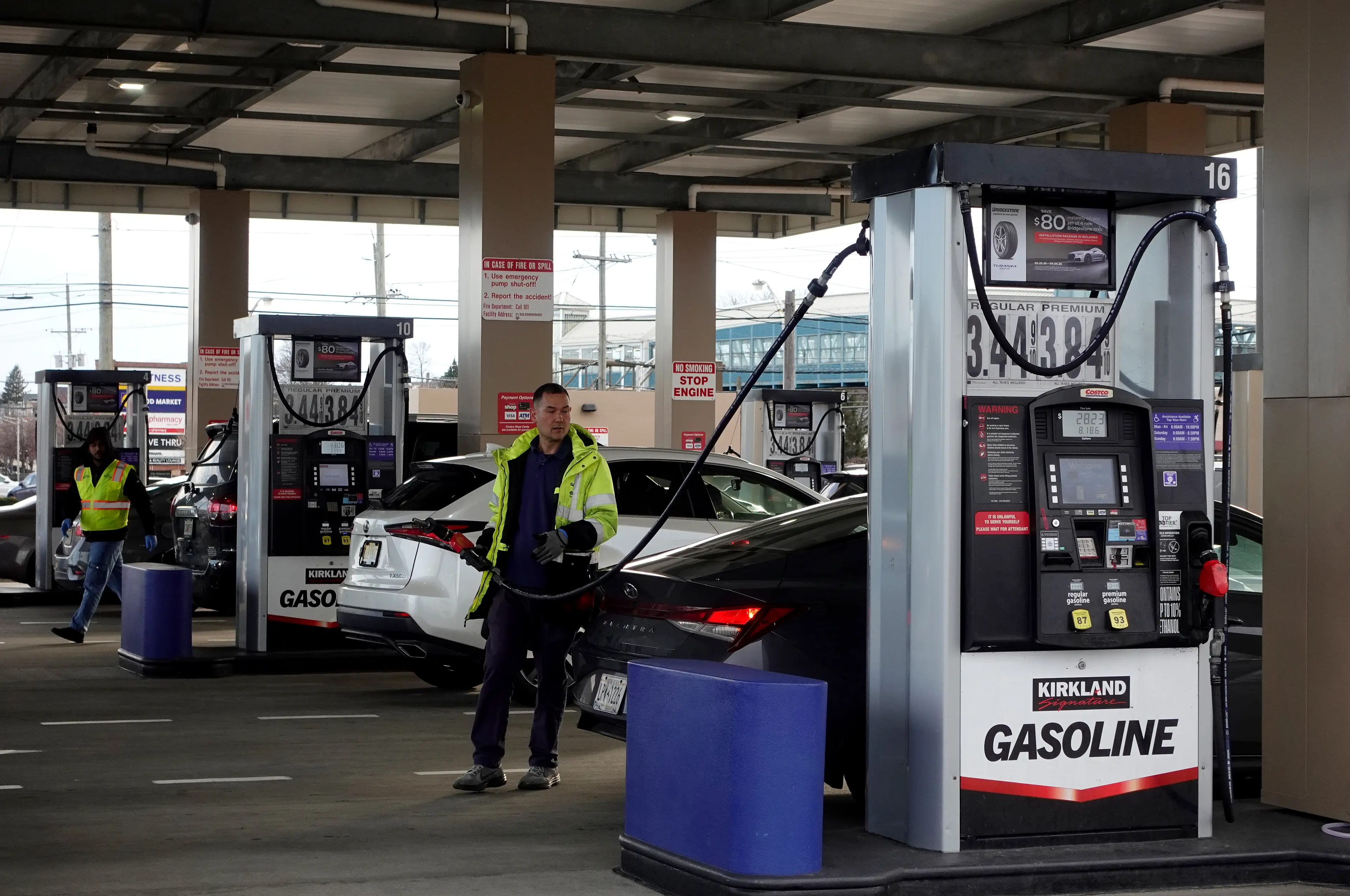 Costco gas station pump attendants in New Jersey (Gary Hershorn/Getty Images)